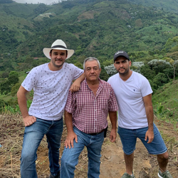Portrait of Jairo Arcila and his sons on their Colombian coffee farm, Jardines Del Eden