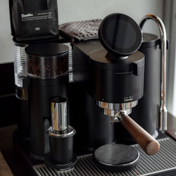 A close up of the black Meraki espresso machine